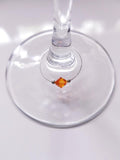 tangerine swarovski crystal wine glass charm accented with 2mm silver beads on silver wire